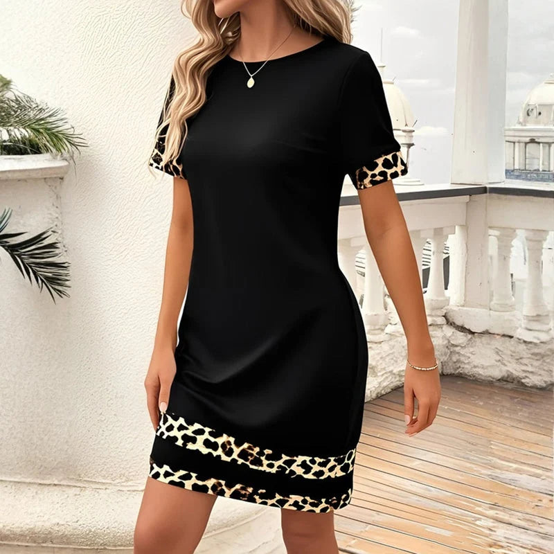 Manelle - Cómodo Vestido Negro con Detalles de Leopardo